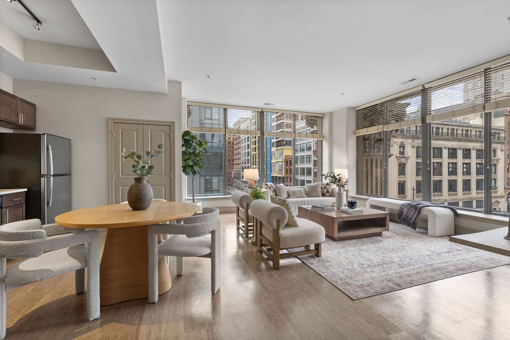 Open-plan living area with round dining table
