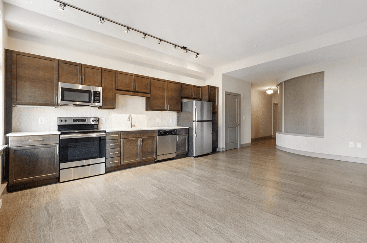 Open kitchen with stainless steel appliances