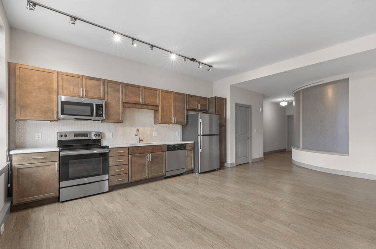 Modern open kitchen with stainless appliances